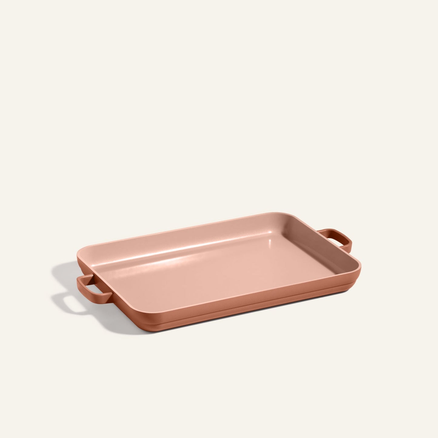 Griddle Pan with handles on both sides, placed on a neutral background—perfect for pairing with your favorite nonstick sheet pan for easy baking and cleanup.